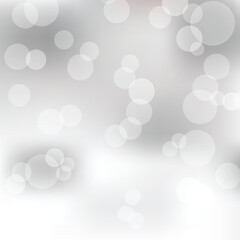 Fototapete - White bokeh lights on white and gray background. bokeh lights. shining bokeh abstract background. christmas light. festive designs. glowing light. bokeh background