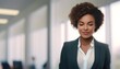 © Stanislava - African american businesswoman, young successful black woman in suit smiling on the office background