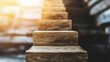 © Jittapon - Wooden stairs ascending towards the light symbolizing the journey of business leadership and team strategy to reach new milestones and heights of success  A visual metaphor for progress achievement