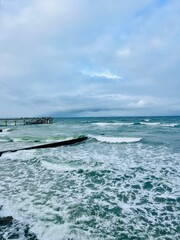 Sticker - Cloudy seascape, seashore waves, natural sea horizon, cloudy sky