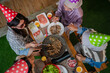 © Odua Images - A lively barbecue where friends happily enjoy delicious food and festivities together