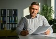 © Running opossum - Businessman reading and signing paperwork in sunlit office
