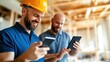 © Pinklife - A builder in a hard hat examines construction site details on a digital device, highlighting construction, technology, safety, and industrial progress.