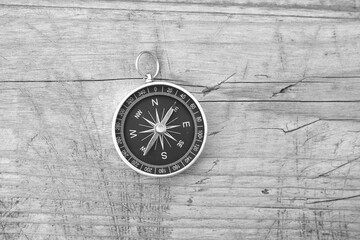 Wall Mural - classic navigation compass on natural background