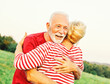 © Lumos sp - woman man outdoor senior couple happy lifestyle retirement together smiling love hug nature mature