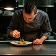 © Kenny - Chef preparing a gourmet dish in a modern restaurant kitchen