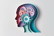 © VICHIZH - Creative paper cut illustration of a human head with colorful gears representing thoughts and ideas. Concept of creativity and innovation in design.