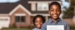 © Tonton54 - property loan mortgage qualification concept. Two children smiling outdoors holding papers, house in background.