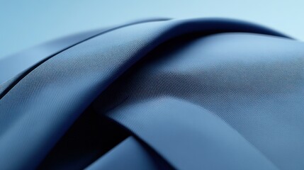 Fototapete - A close-up of smooth, folded blue fabric showcasing texture and color.