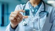 © Chanagun - A healthcare professional holds a microchip, symbolizing the fusion of technology and medicine in modern healthcare.