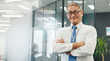© Wesley JvR/peopleimages.com - Mature, portrait and businessman with arms crossed in hospital for healthcare services and about us. Proud, happy medical inspection or confident medical safety director at wellness clinic in Japan