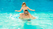 © be free - Father with kid in swimming pool. Fatherhood at summer vacation. Summer vacation at pool. Father son beach adventure. Family bonding of father and son. Family day with dad and son