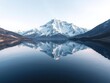 © Supharak wonginyoo - The snow-capped summit of Nanga Parbat perfectly mirrored on the surface of a calm and serene lake, lake reflection, serenity, outdoor scene