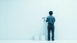 © Chen - Back View of a Man Painting a White Wall with a Roller Brush in a Minimalist Interior Renovation Scene