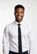 © Pixel Diversity - smiling man, professional attire, white shirt, black tie, studio portrait, confident expression, well-groomed, soft lighting, neutral background