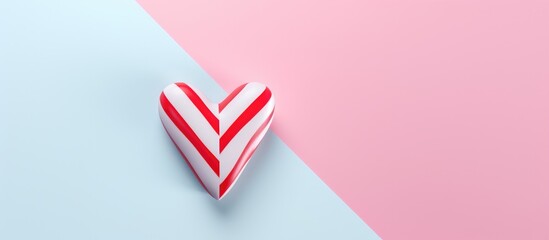 Sticker - Vibrant heart-shaped candy cane on a pastel background showcasing a minimalistic and festive design perfect for holiday themes