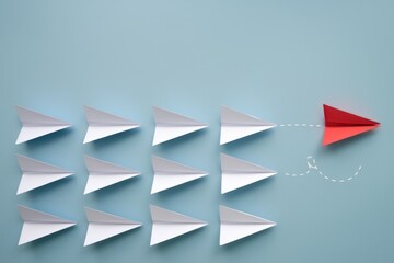Aufkleber - Red paper airplane taking a different path than white ones