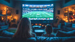 © kudesniza - Mother and daughter watching football game in cozy living room at night