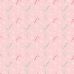 Wall Mural - Christmas seamless pattern.Green and red candy canes with snowflakes isolated on light red background.Vector graphic illustration background wallpaper.