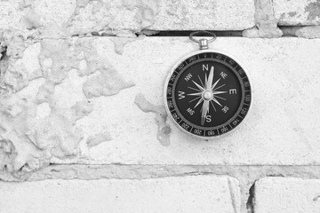Wall Mural - classic navigation compass on natural background