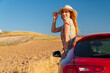 © FATIR29 - Two girlfriends traveling by car. Happy woman looking out of car window