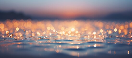 Poster - seaside bokeh effect at sunset creating a dreamy atmosphere with shimmering water and soft lighting 