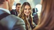 © Jack - Smiling flight attendant serving drinks to passengers in aircraft cabin, showcasing exceptional airline service and customer satisfaction.