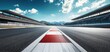 © Vladimir - An evening view of an asphalt international race track with a starting or finishing line, featuring a digitally recomposed background.