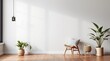 © NipaArts - Modern living room interior with a chair, two potted plants, and a pendant light.