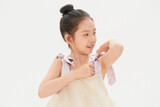 Lively and cute little Chinese girl on white background  child