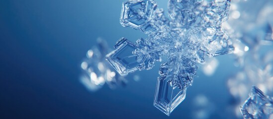 Wall Mural - crystal snowflake macro shot showcasing intricate details against a soft blue background perfect for
