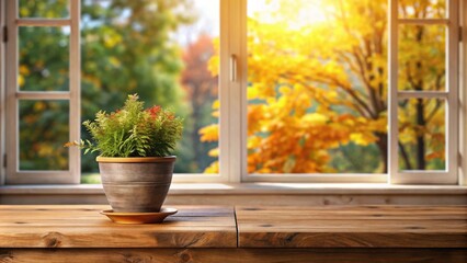 Aufkleber - A potted plant on a wooden table against a window with a blurry view of autumn foliage outside.
