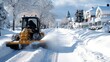 © Pinklife - A yellow snowplow moves snow from the road on a picturesque street lined with snow-covered trees and charming houses, creating a safe pathway on a winter morning.