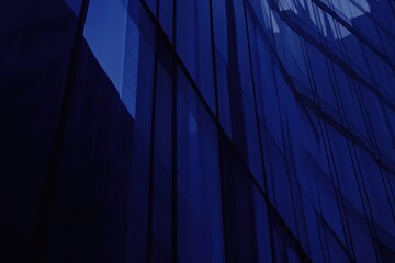 Leinwandbilder - Abstract view of a modern glass building with blue tones and reflections.
