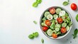 © Isolated studio - Fresh Cucumber and Tomato Salad in a Bowl with Basil Leaves