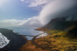 © SNEHIT PHOTO - Aerial view of cloud cover mountains in Iceland eastern shore line
