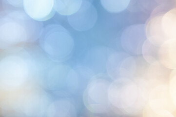 Wall Mural - soft bokeh lights creating a dreamy atmosphere on a clear blue background