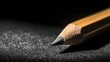 © Penatic Studio - Close Up Of A Sharpened Graphite Pencil On Dark Surface