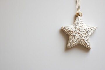 Wall Mural - white star ornament on light background, festive design