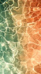 Wall Mural - abstract image of shimmering water with gradients of teal and orange hues.