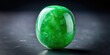 © Watcharapon - Close up of exquisite green jade gemstone , precious, stone, valuable, luxury, jewelry, gem, mineral, natural, texture