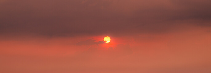 Wall Mural - aerial of cloud with sunset sky background in thailand,cloudscape time lapse background dark red pur