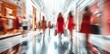© zhuan - Abstract blurred background of luxury shopping mall with women walking, holding fashion bags, motion blurred female models in red dress and white shoes, long exposure shot