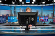 © Emanuel - Teleprompter displaying text for a live news broadcast