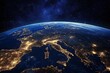 © mobile - Earth at Night View from Space City Lights of Italy and Europe with Dark Ocean and Bright Starry Sky