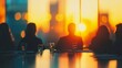 © Chayanan - Blurred Silhouettes of Executives in Conference Room Meeting - Defocused Business Background