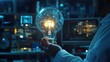 © delvin std - A scientist holds a glowing light bulb, symbolizing innovation and creativity in technology.
