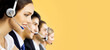 © vgstudio - Face portrait - contact center service concept image. Call center phone line operators, sales agents, answering workers work at office workplace. Isolated yellow background. Representative callcenter.