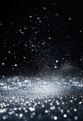 Wall Mural - shimmering silver sparkles on a dark background create a mesmerizing texture. soft blue lights creat