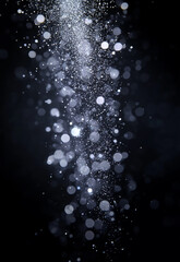 Wall Mural - shimmering silver sparkles on a dark background create a mesmerizing texture. soft blue lights creat